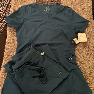Cherokee Infinity Teal Blue Scrubs NWT. Top and Bottom size XS.